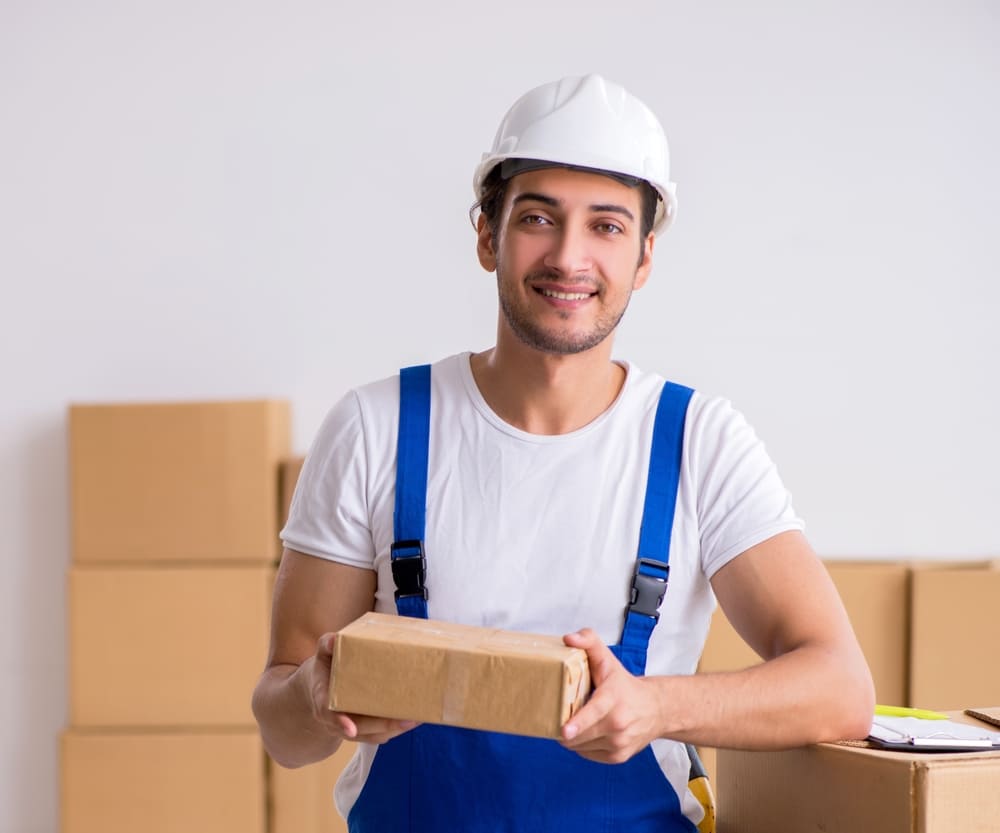 Professional movers carrying boxes in Hialeah Gardens, FL